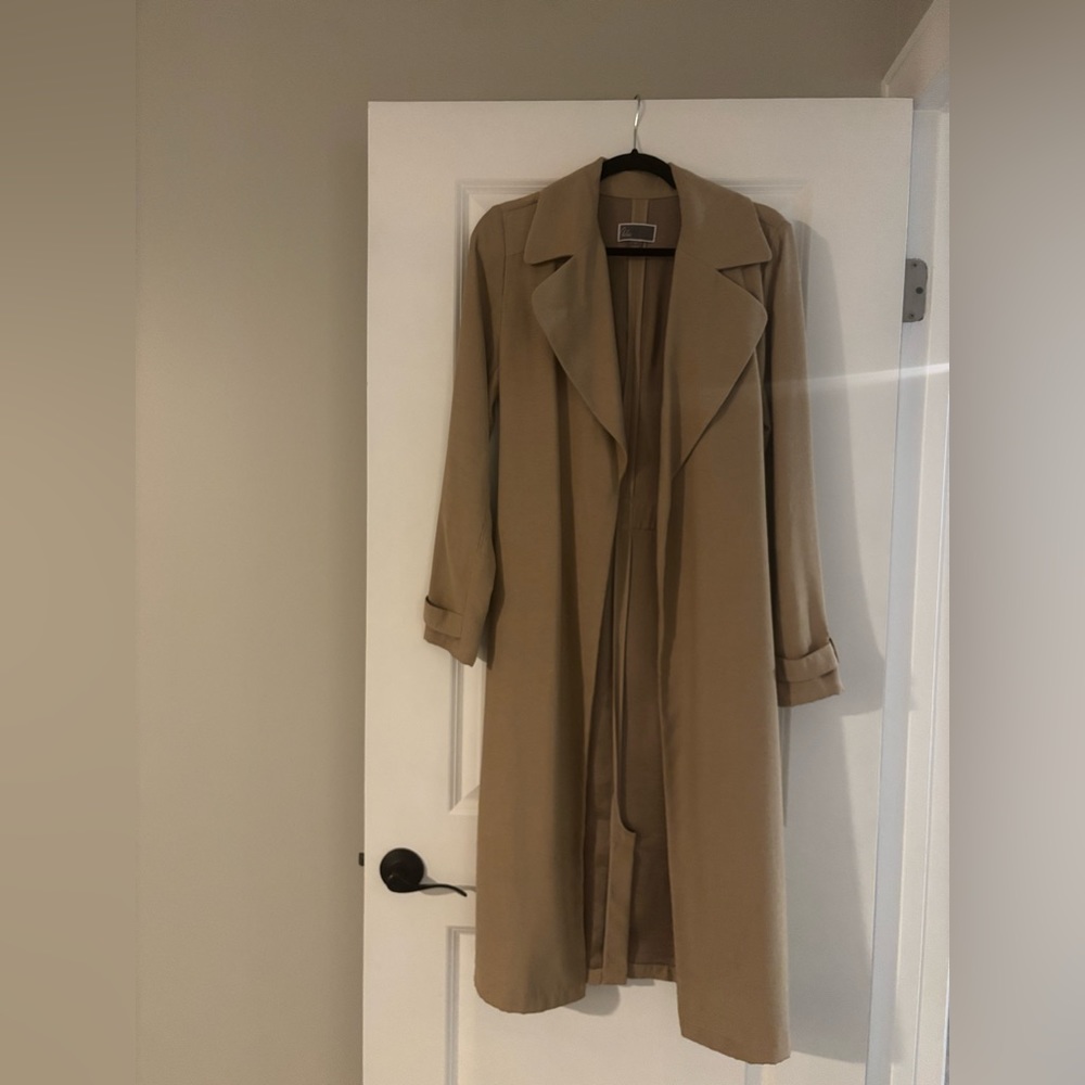 Medium long trench coat in linen/like material; very chic and used only once.